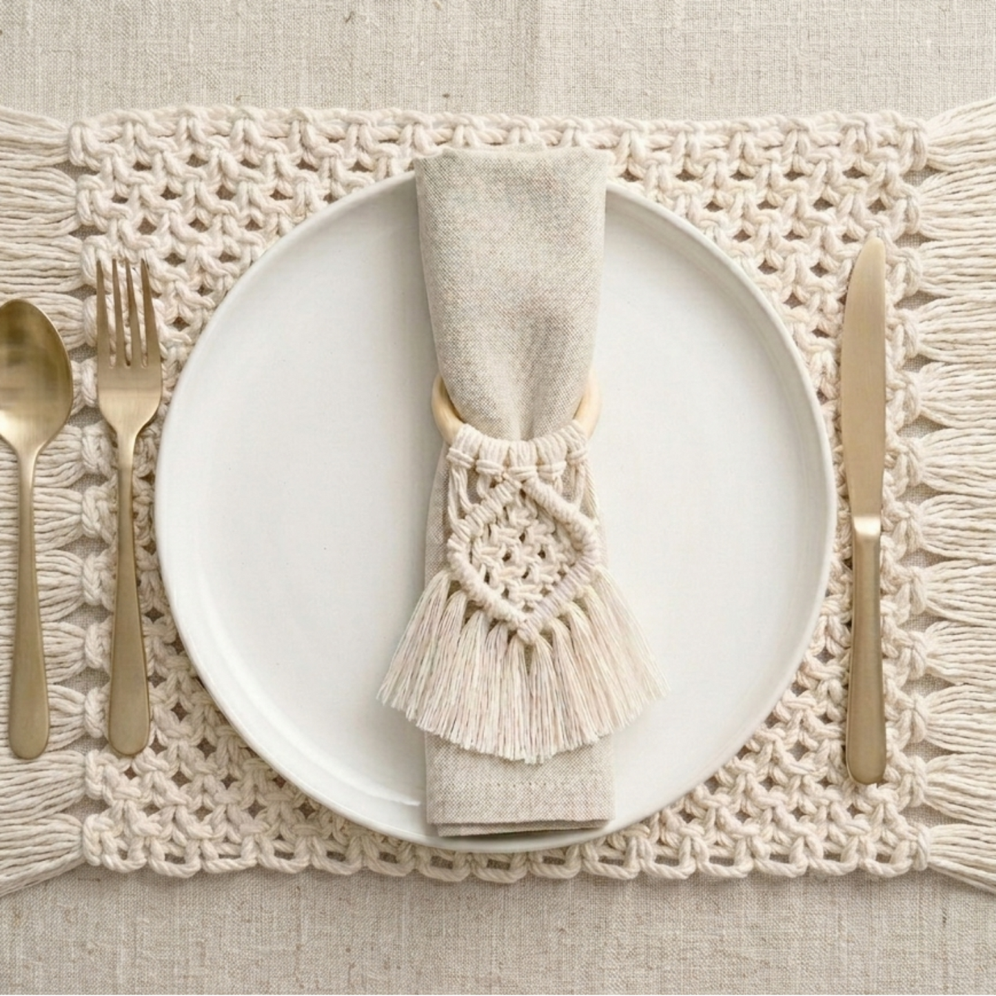 Handmade macramé napkin ring in natural cotton with intricate knot detail for boho table décor