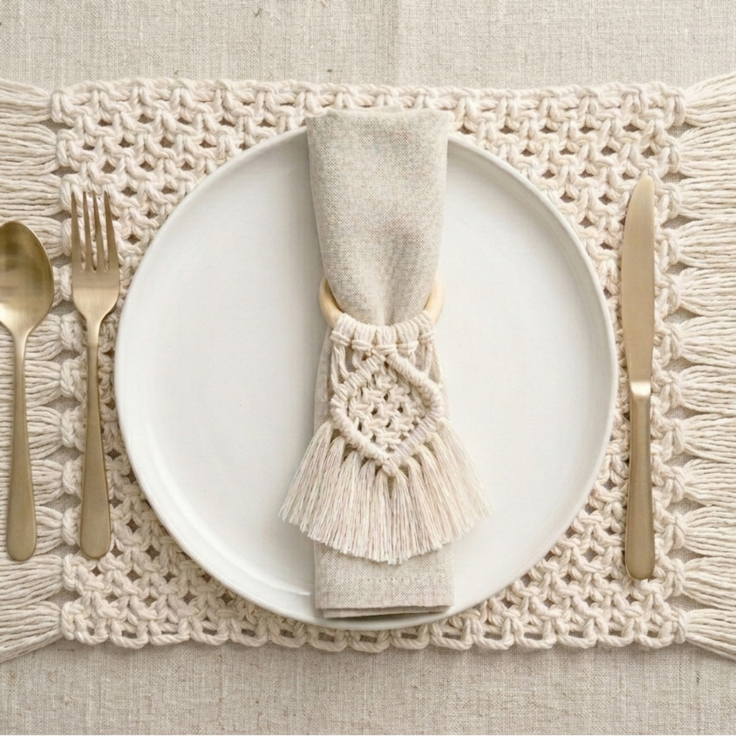 Handmade macramé napkin ring in natural cotton with intricate knot detail for boho table décor
